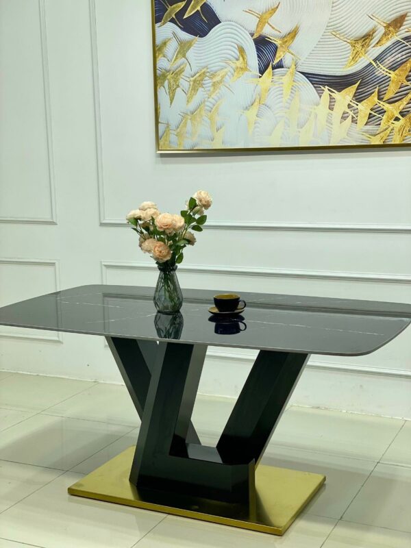 z4283352712344_7581f31ce5f2587e51d95453e298a805-600x800-1 Bộ bàn ăn cao cấp mặt đá chân LV nhập khẩu kèm ghế Baret